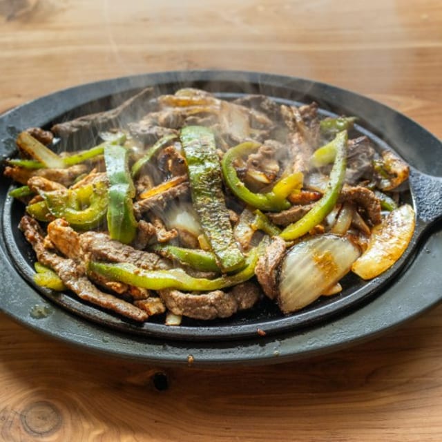 Fajitas (Steak, Chicken, or Combo).